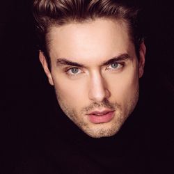 SIMON F.